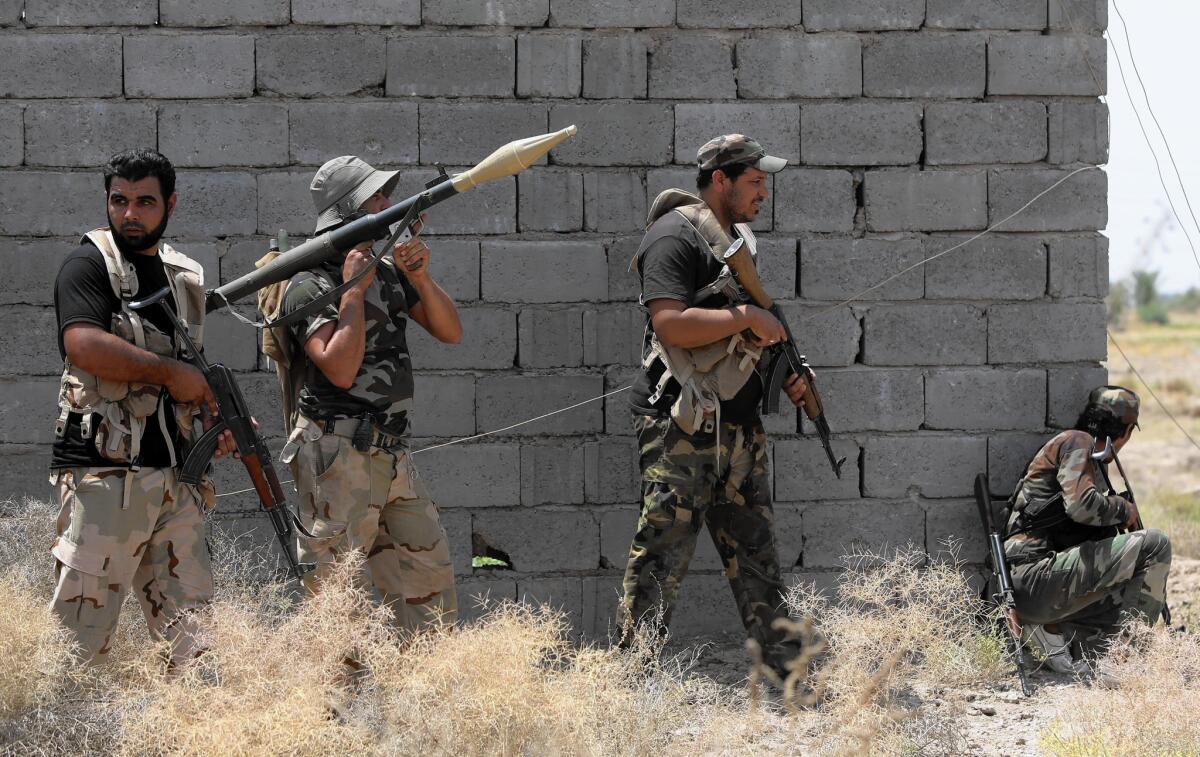 Iraqi Shiite fighters with the Popular Mobilization Units in Saqlawiya on the outskirts of Fallouja on July 15, 2015.