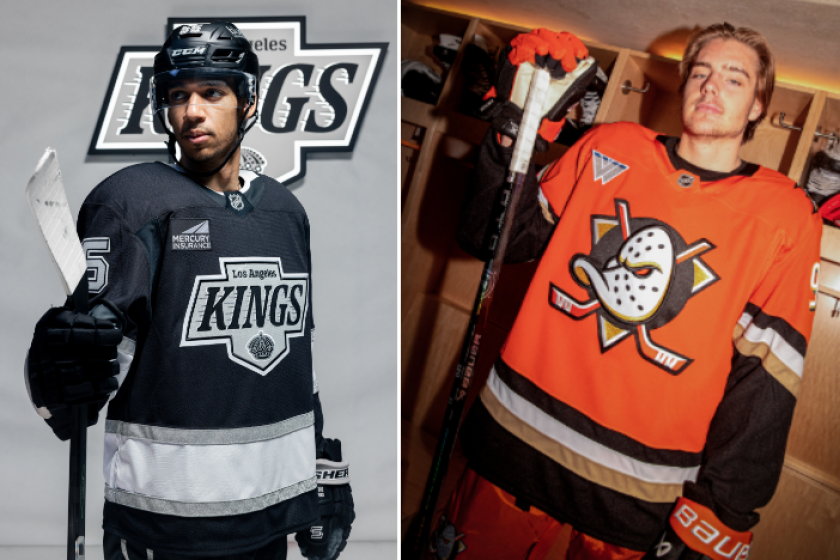Quinton Byfield of the Kings, left, and Leo Carlson of the Ducks show off their teams' new looks for the 2024-25 season.