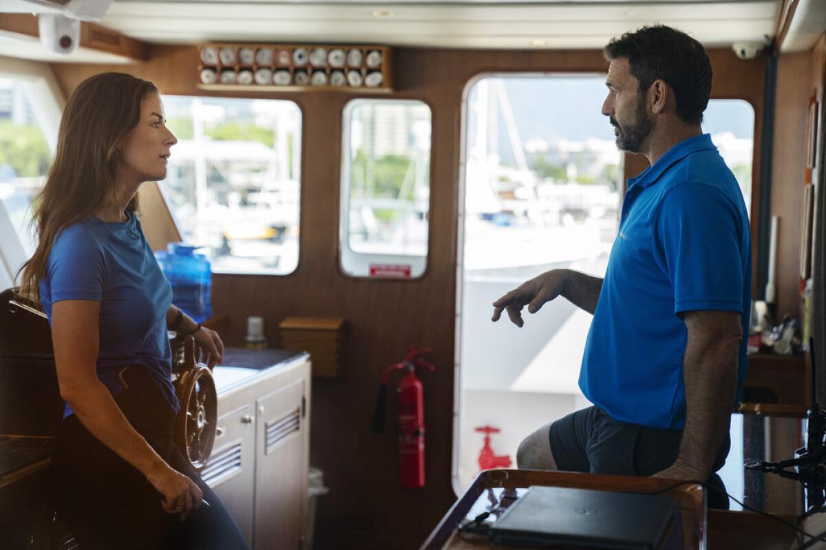 A woman and a man talk  in "Below Deck Down Under."
