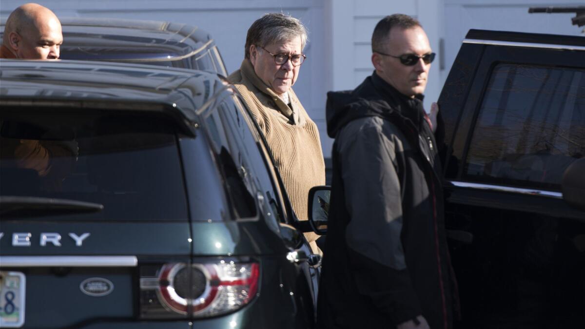 Atty. Gen. William Barr leaves his home in McLean, Va., on Saturday morning.