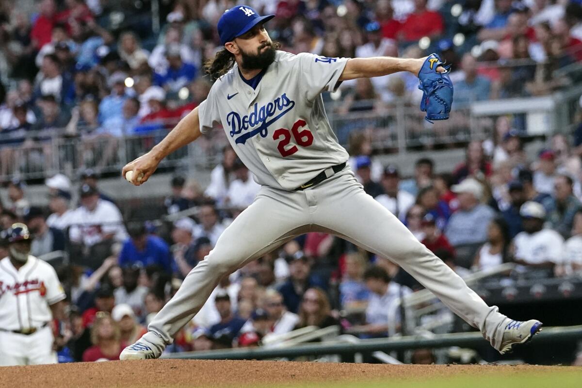Dodgers pitcher Tony Gonsolin works in the sixth inning against the Atlanta Braves on in Atlanta.