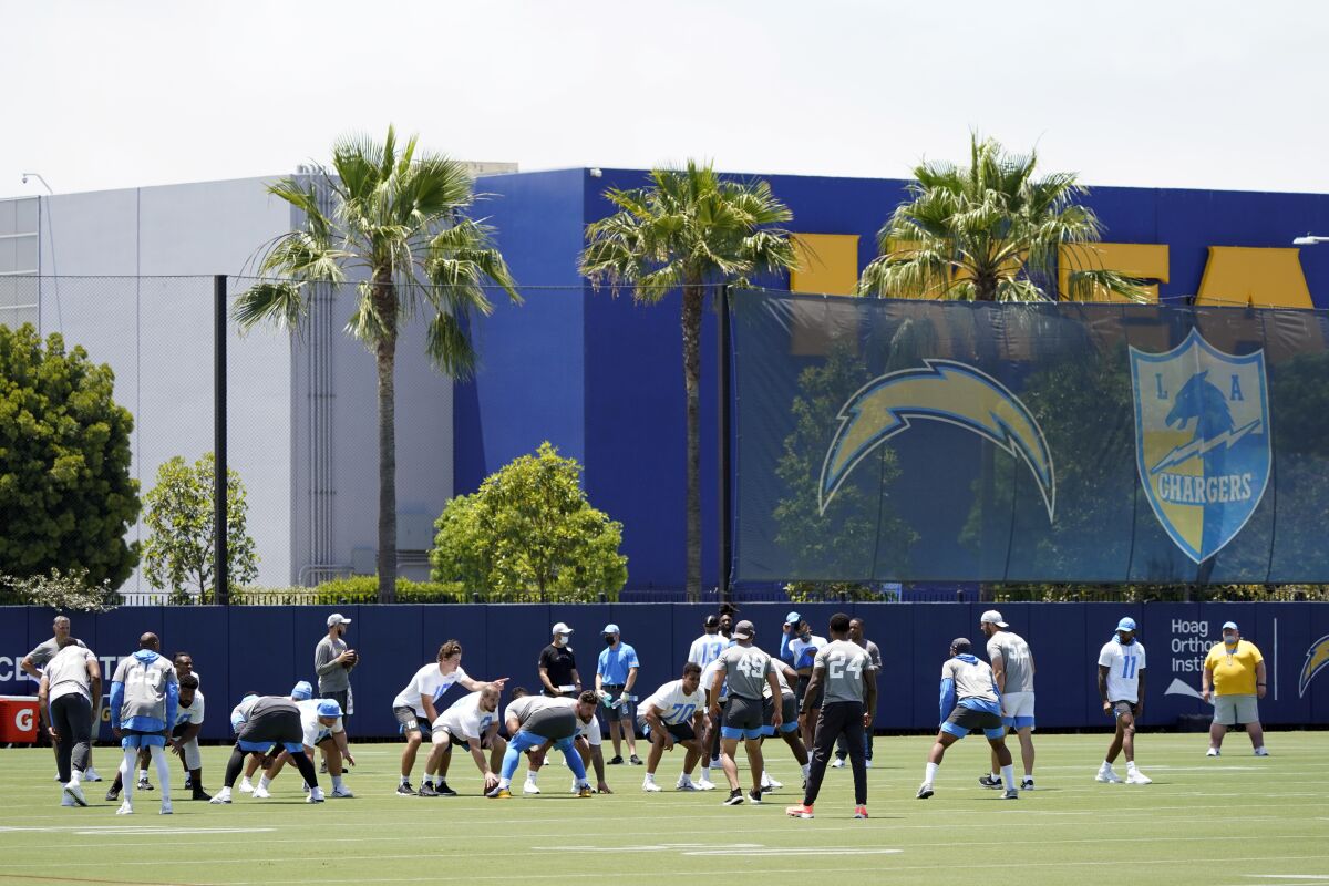 Chargers players take part in organized team activities at the team's practice facility in Costa Mesa on Tuesday.
