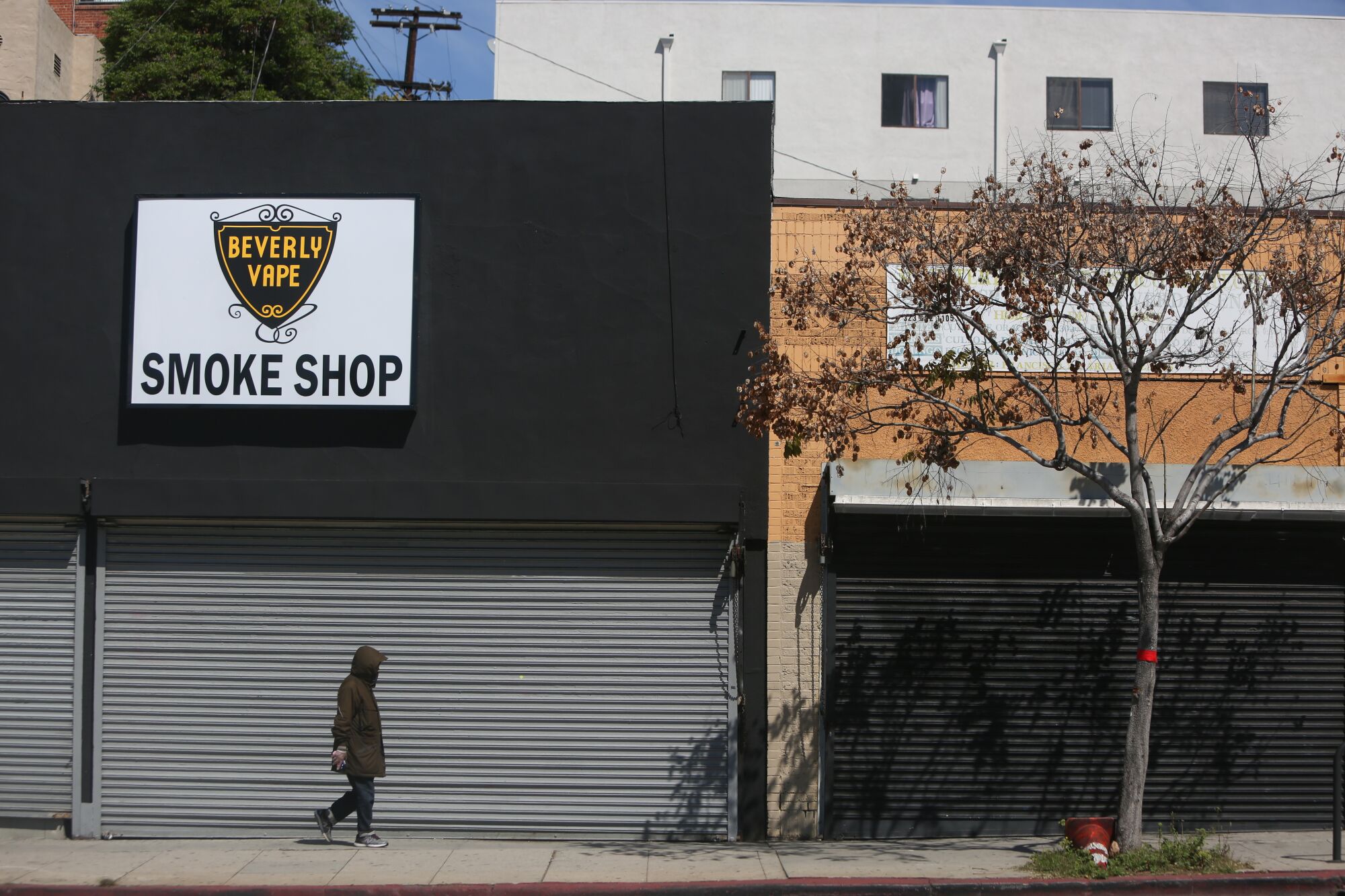 Ben Barcelona en route to his daughter’s Koreatown apartment. The typically bustling urban neighborhood is largely deserted as Californians shelter at home for fear of catching the coronavirus.