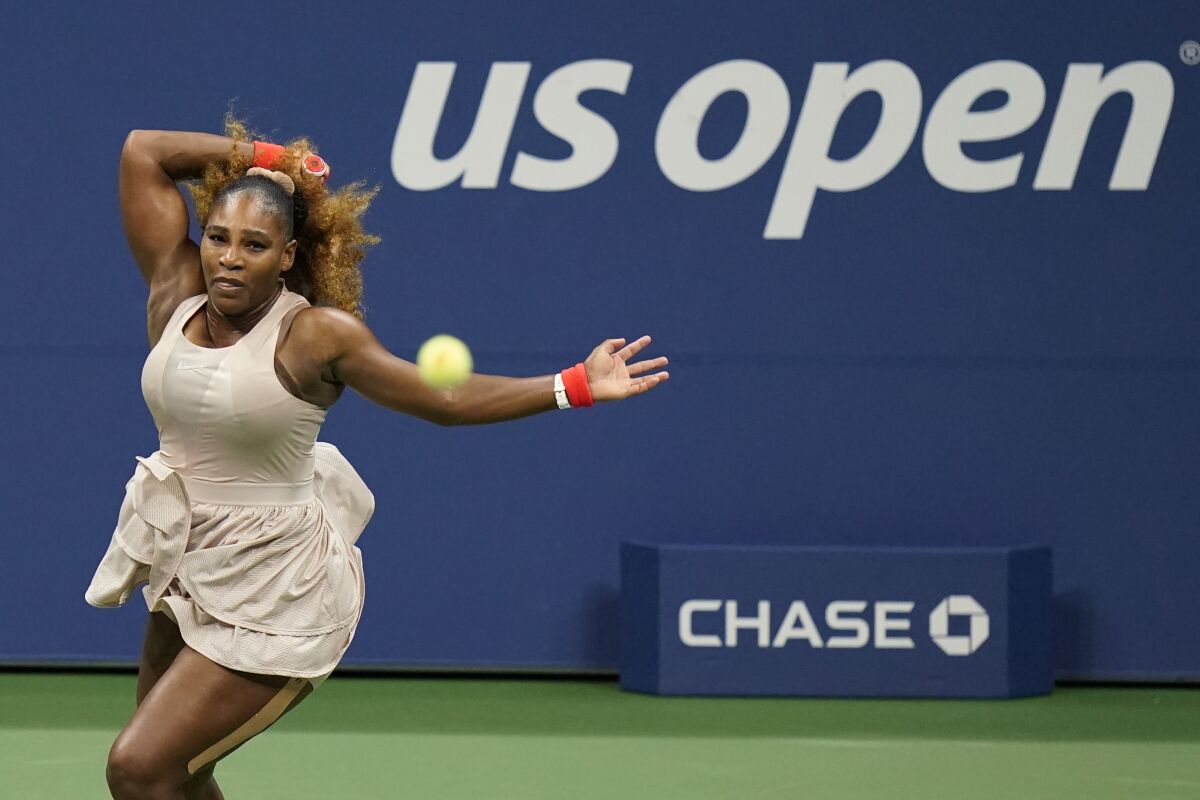 Serena Williams returns a shot to Margarita Gasparyan.