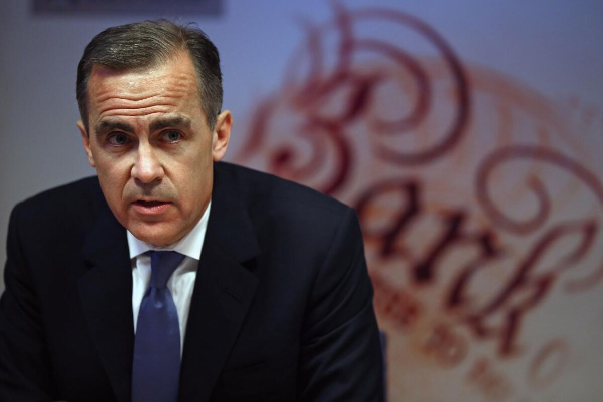 Bank of England Governor Mark Carney appears at a news conference Wednesday.