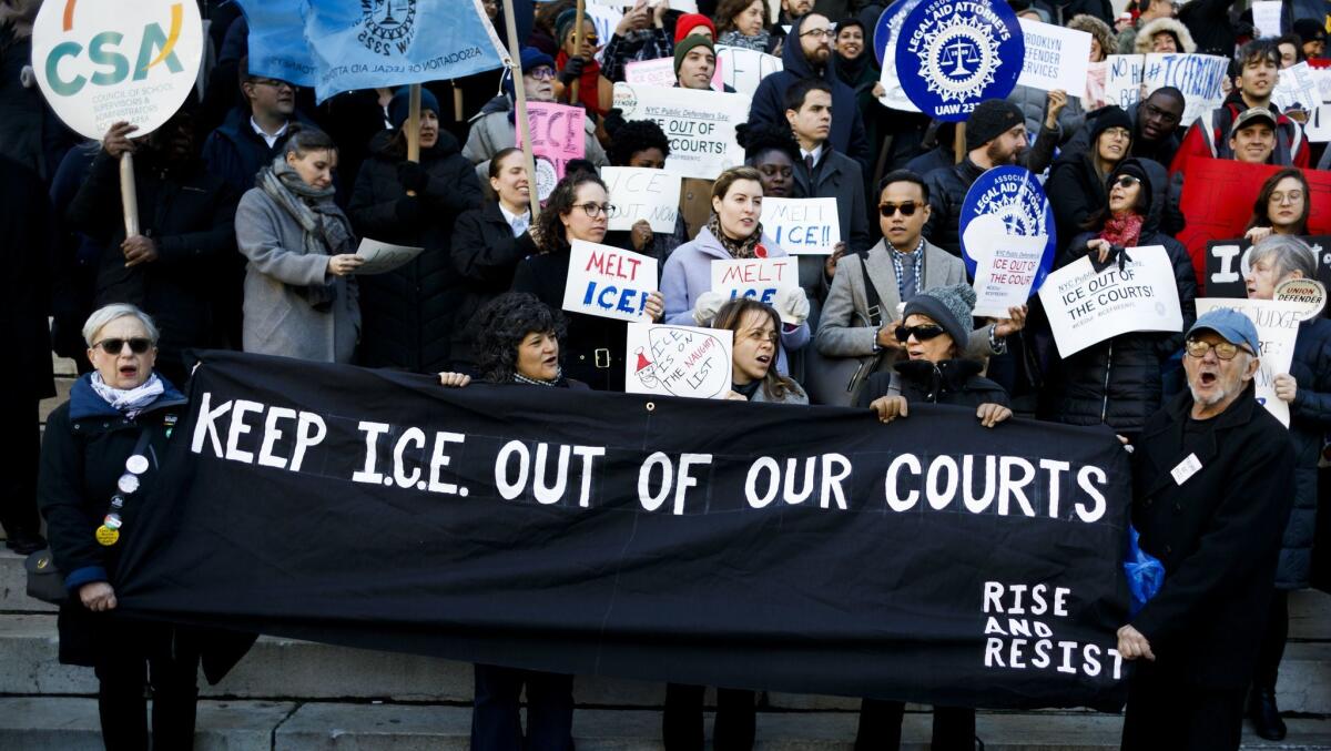 Protesters rally in 2017 against ICE arrests at courthouses