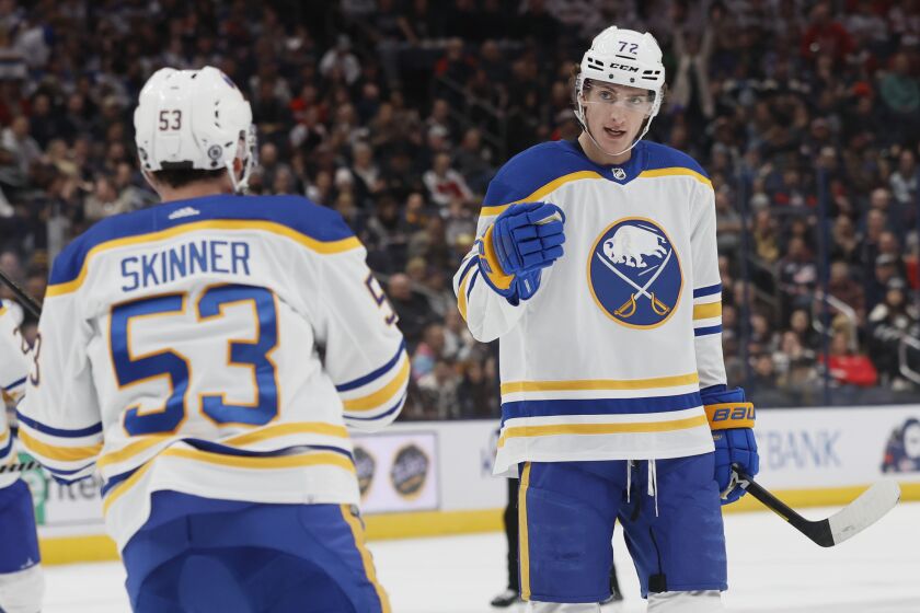 Buffalo Sabres' Tage Thompson, right, celebrates his goal against the Columbus Blue Jackets with Jeff Skinner during the first period of an NHL hockey game Wednesday, Dec. 7, 2022, in Columbus, Ohio. (AP Photo/Jay LaPrete)