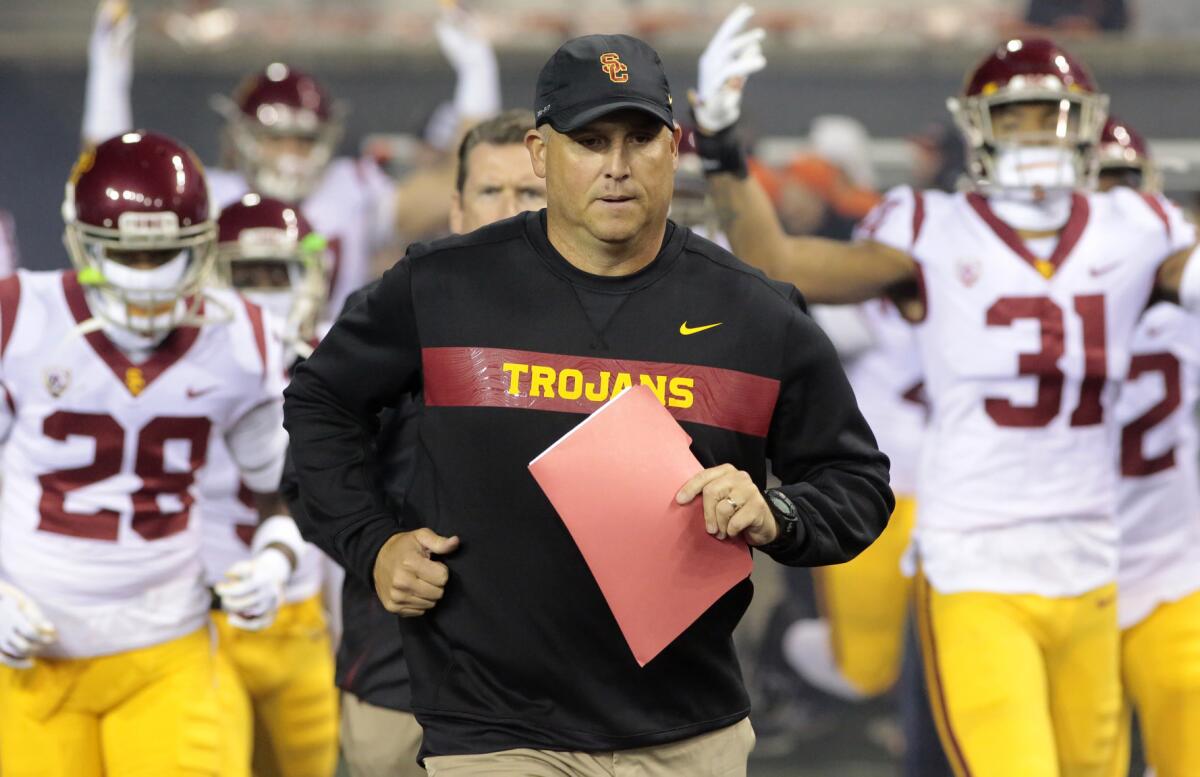 Another former Texas coach is joining Clay Helton's coaching staff at USC.