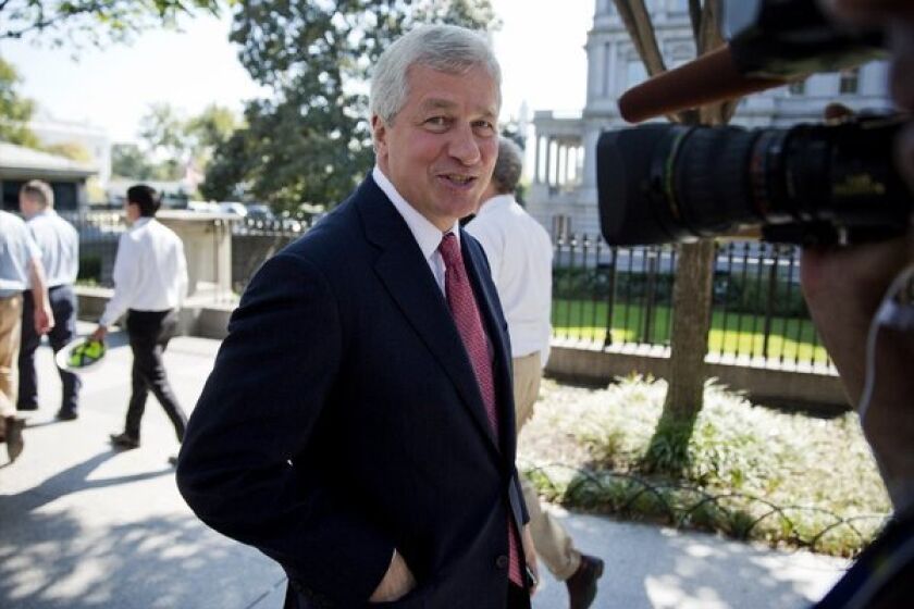 Why is this man smiling? The not-embattled JPMorgan chairman and CEO Jamie Dimon leaves a meeting with President Obama over the budget standoff last week.