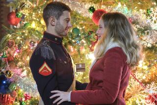  Julian Morris and Megan Park in "A Royal Queens Christmas" on Hallmark.