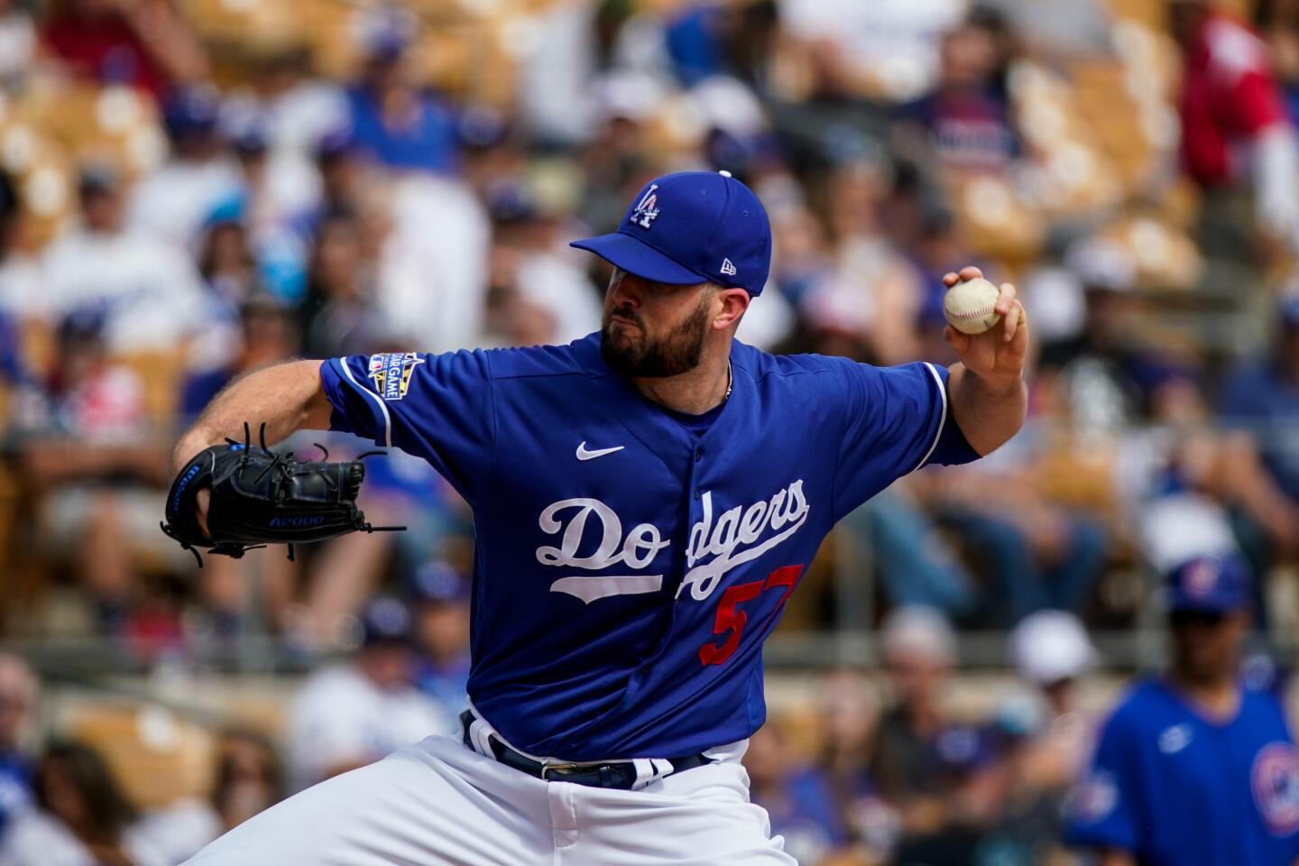 Dodgers starting pitcher Alex Wood delivers during a spring training exhibition game against the Chicago Cubs at Camelback Ranch on Feb. 23, 2020.