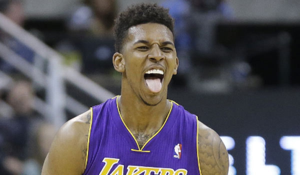 Nick Young reacts after hitting a three-pointer against Utah.
