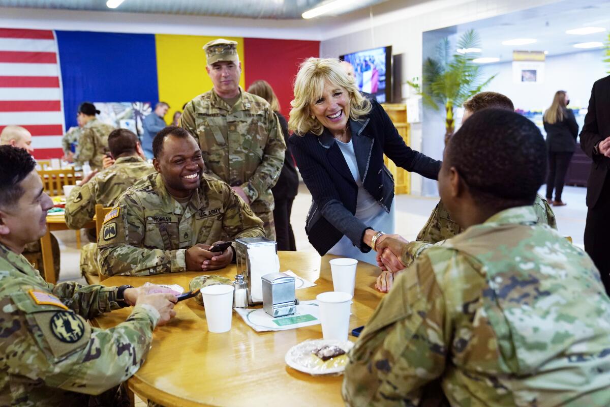 First lady Jill Biden meets U.S. troops during a visit to the Mihail Kogalniceanu Air Base in Romania, Friday, May 6, 2022. (AP Photo/Susan Walsh, Pool)