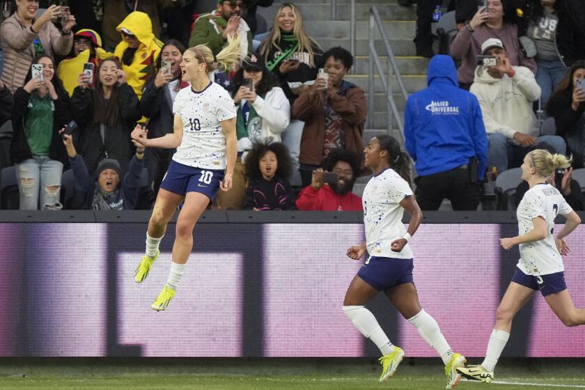 United States midfielder Lindsey Horan (10) celebrates after scoring on a penalty kick.