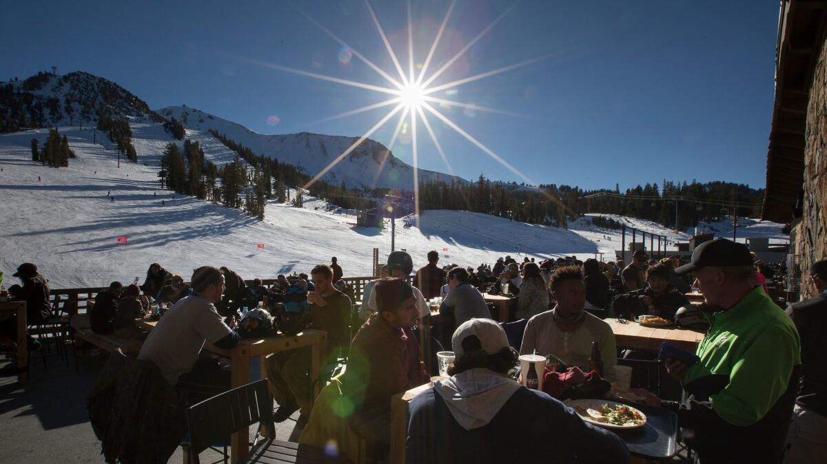 Skiers and snowboarders fill Tusks Bar at the base of Mammoth Mountain in Mammoth Lakes on Dec. 3, 2016. Ski resort operators are expecting a near-record season with higher ticket prices.