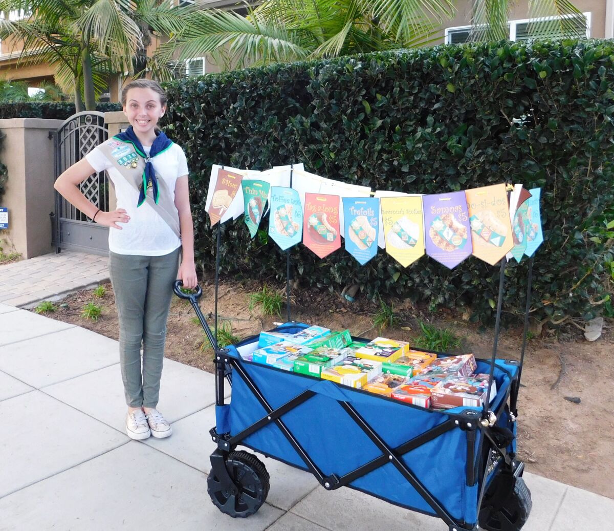 Senior Girl Scout BellaRose Uhrig taking her cookie-filled wagon around Pacific Beach during a previous cookie sale.