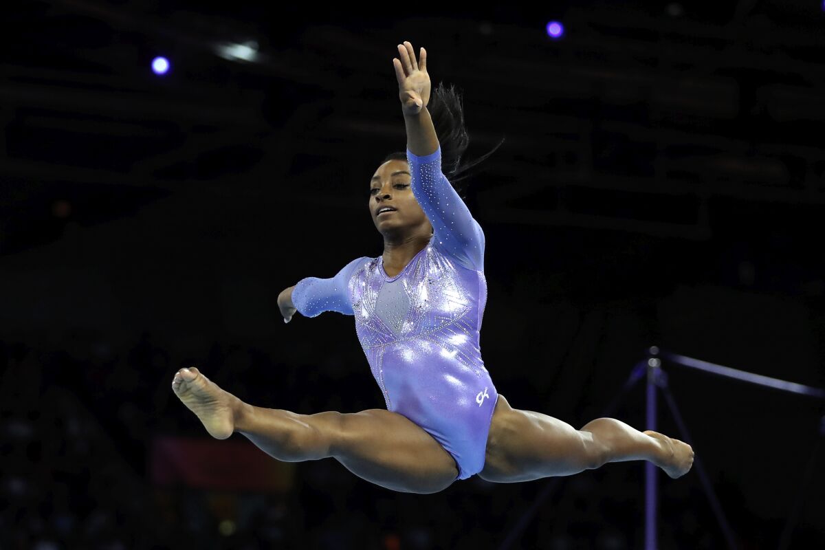 Gold medalist Simone Biles of the United States performs on the floor in the women's apparatus finals at the Gymnastics World Championships in Stuttgart, Germany, on Sunday.