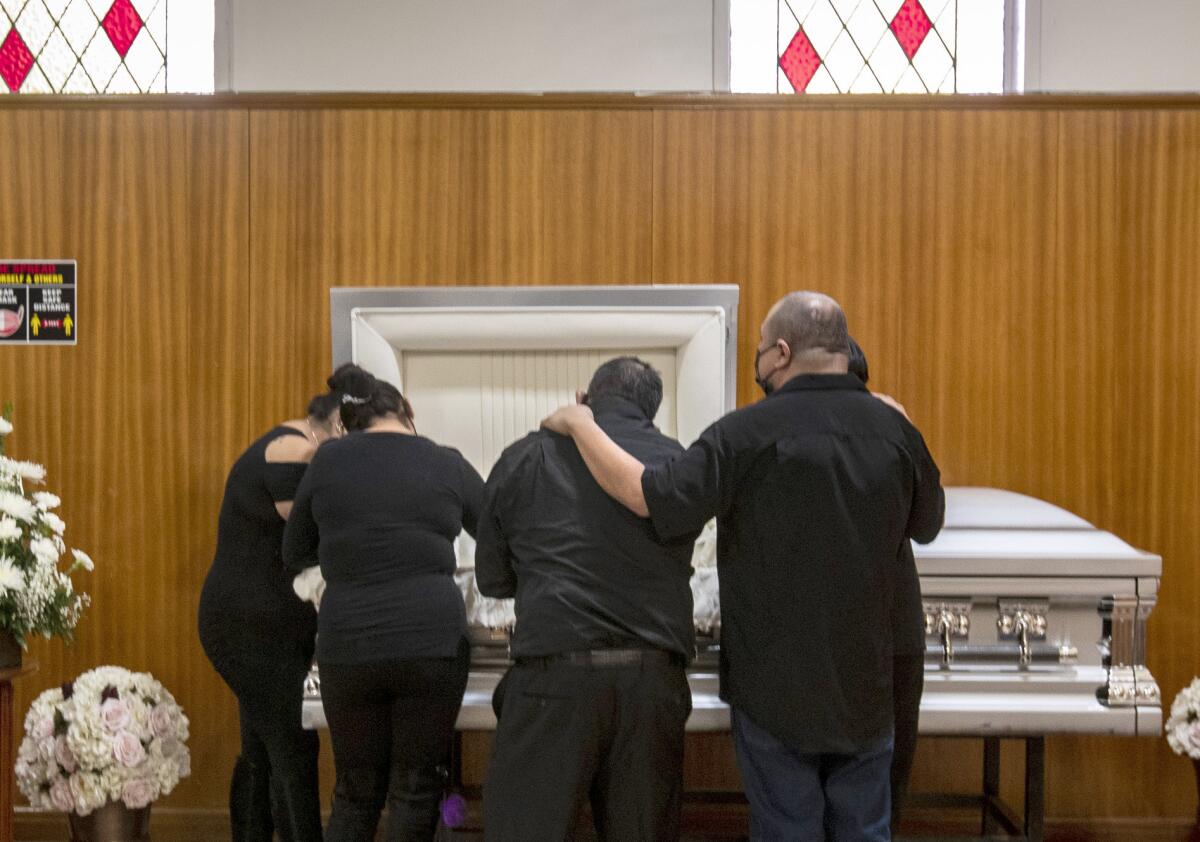 Mourners at funeral 