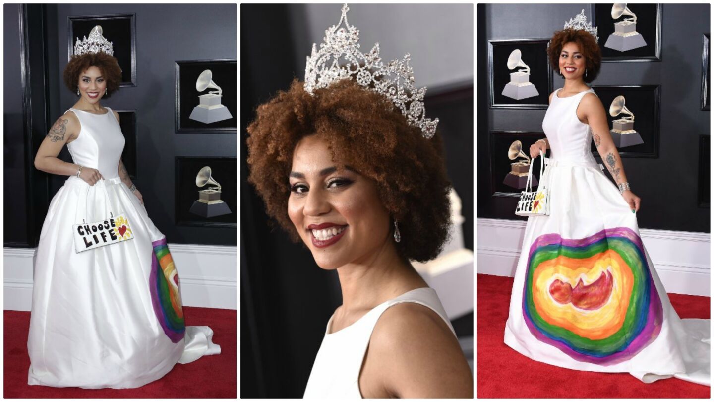 Recording artist Joy Villa displayed her stance as an abortion opponent as she arrives at the 60th Grammy Awards in New York.