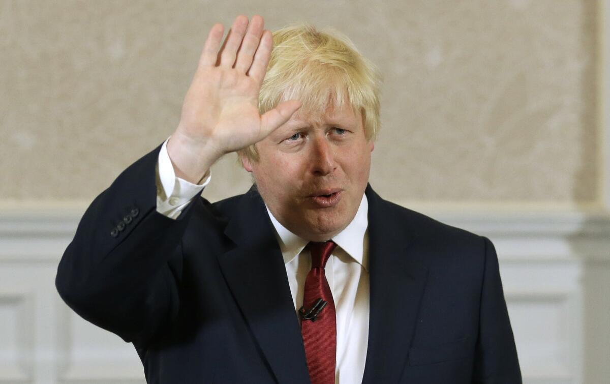 Former London Mayor Boris Johnson waves June 30 as he announces that he will not run for leadership of Britain's ruling Conservative Party.