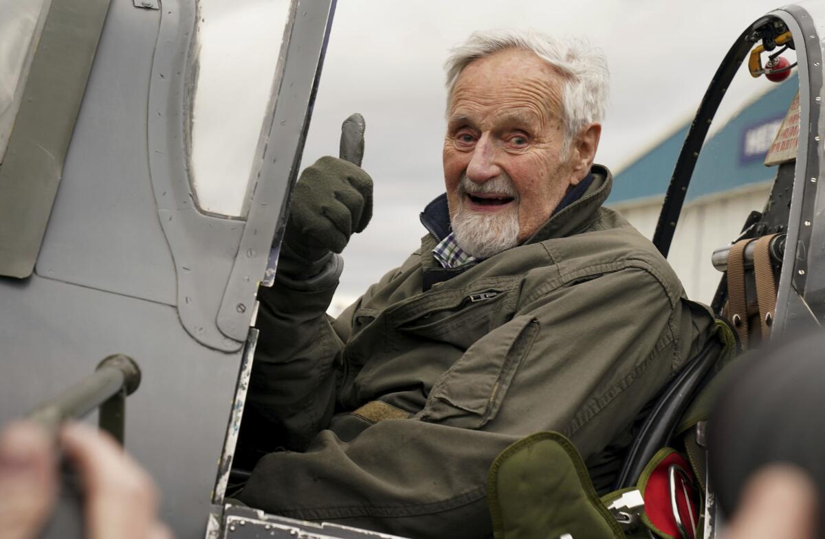 102-year-old British veteran flies a Spitfire on a delightfully bumpy ride  for charity - The San Diego Union-Tribune