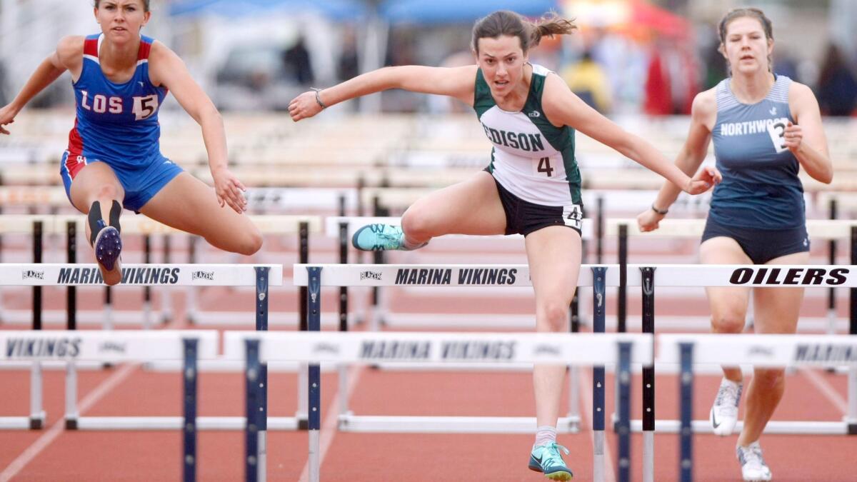 A false start by Edison’s Amanda Herrington, center, in the 100-meter high hurdles at the county championships makes the journey ahead less certain.