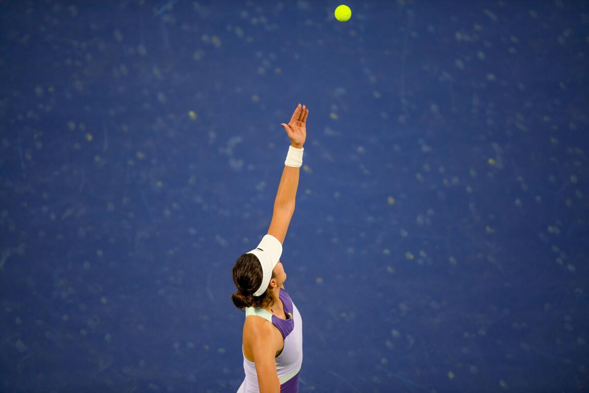 Garbine Muguruza of Spain serves the ball to Kim Clijsters of the Belgium during the WTA Dubai Duty Free Tennis Championship, at the Dubai Tennis Stadium in the United Arab Emirates, on February 17, 2020. (Photo by KARIM SAHIB / AFP) (Photo by KARIM SAHIB/AFP via Getty Images) ** OUTS - ELSENT, FPG, CM - OUTS * NM, PH, VA if sourced by CT, LA or MoD **