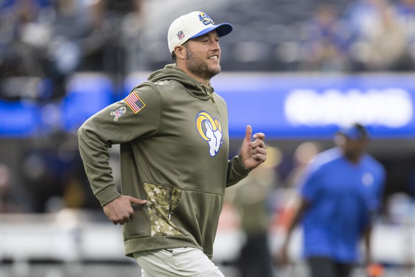 Los Angeles Rams quarterback Matthew Stafford (9) jogs on the field before an NFL football game against the Arizona Cardinals, Sunday, Nov. 13, 2022, in Inglewood, Calif. (AP Photo/Kyusung Gong)