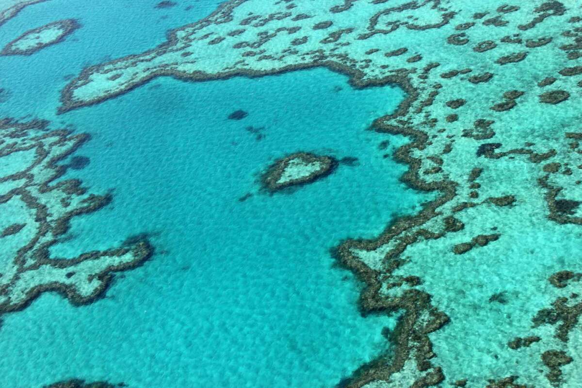 (FILES) This file photo taken on November 20, 2014 shows an aerial view of the Great Barrier Reef off the coast of the Whitsunday Islands, along the central coast of Queensland. Australia on July 2, 2015 hailed a United Nations decision to keep the Great Barrier Reef off its in danger list as "tremendous", but activists warned more must be done to improve the marine park's health. AFP PHOTO / SARAH LAI /FILESSarah Lai/AFP/Getty Images ** OUTS - ELSENT, FPG - OUTS * NM, PH, VA if sourced by CT, LA or MoD **