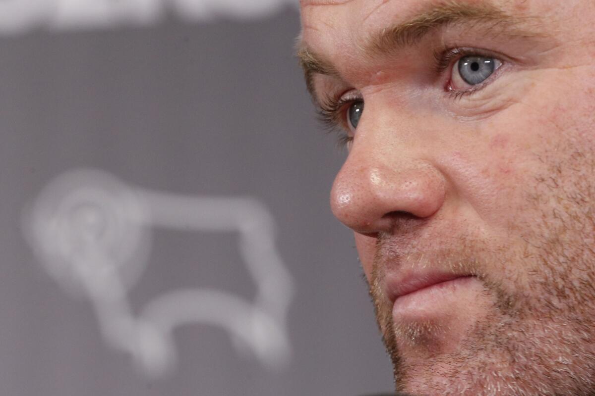 DC United midfielder and former England captain Wayne Rooney speaks during a press conference at Pride Park Stadium in Derby on August 6, 2019 after Rooney agreed a deal to become a player-coach. - Former England captain Wayne Rooney is to leave Washington-based DC United after agreeing a deal to become player-coach of English Championship side Derby County. The 33-year-old -- the record goalscorer for both his country and Manchester United -- signed an 18-month contract with the second-tier side, who under Rooney's former England teammate Frank Lampard reached the play-off final last season. (Photo by Darren STAPLES / AFP)DARREN STAPLES/AFP/Getty Images ** OUTS - ELSENT, FPG, CM - OUTS * NM, PH, VA if sourced by CT, LA or MoD **