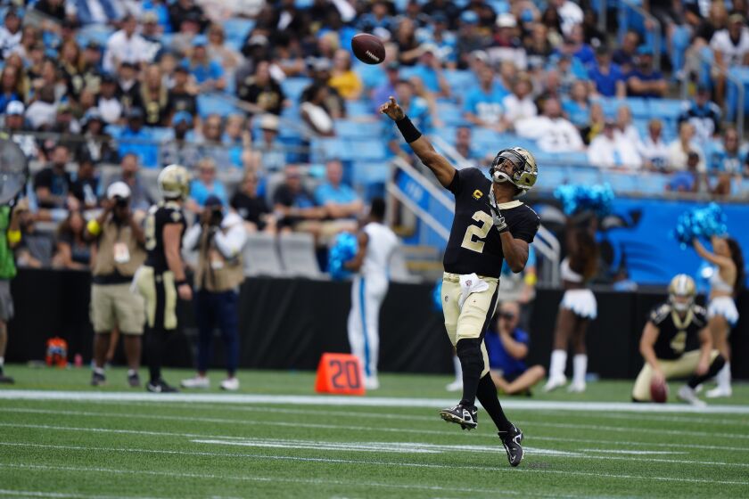 New Orleans Saints quarterback Jameis Winston (2) throws a touchdown pass during the second half of an NFL football game against the Carolina Panthers, Sunday, Sept. 25, 2022, in Charlotte, N.C. (AP Photo/Jacob Kupferman)