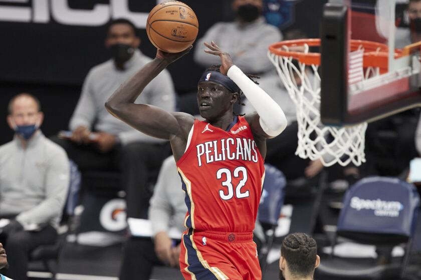 New Orleans Pelicans forward Wenyen Gabriel (32) looks to pass the ball during the first half of the team's NBA basketball game against the Charlotte Hornets on Sunday, May 9, 2021, in Charlotte, N.C.. (AP Photo/Brian Westerholt)