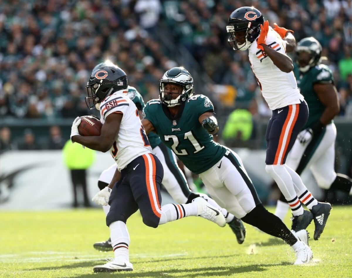 Bears running back Tarik Cohen carries the ball against the Eagles during the first half of a game at Lincoln Financial Field.