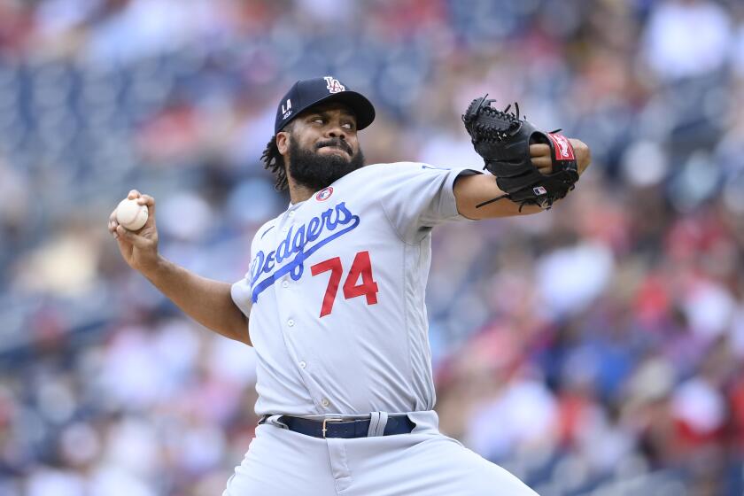 Los Angeles Dodgers relief pitcher Kenley Jansen (74) delivers a pitch during a baseball game against the Washington Nationals, Sunday, July 4, 2021, in Washington. The Dodgers won 5-1. (AP Photo/Nick Wass)