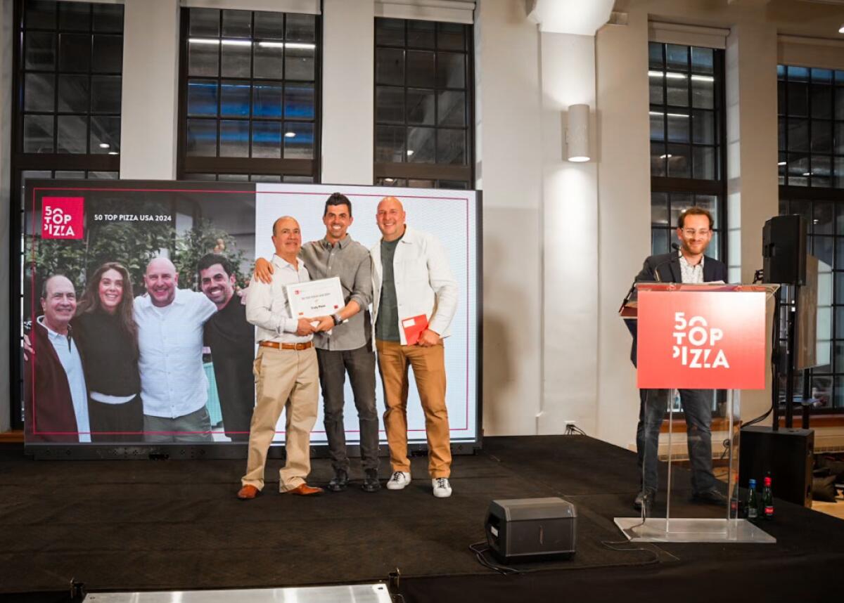 John Arena, Michael Vakneen and Chris Decker of Truly Pizza at the awards ceremony for the "50 Best Pizzerias in the USA."