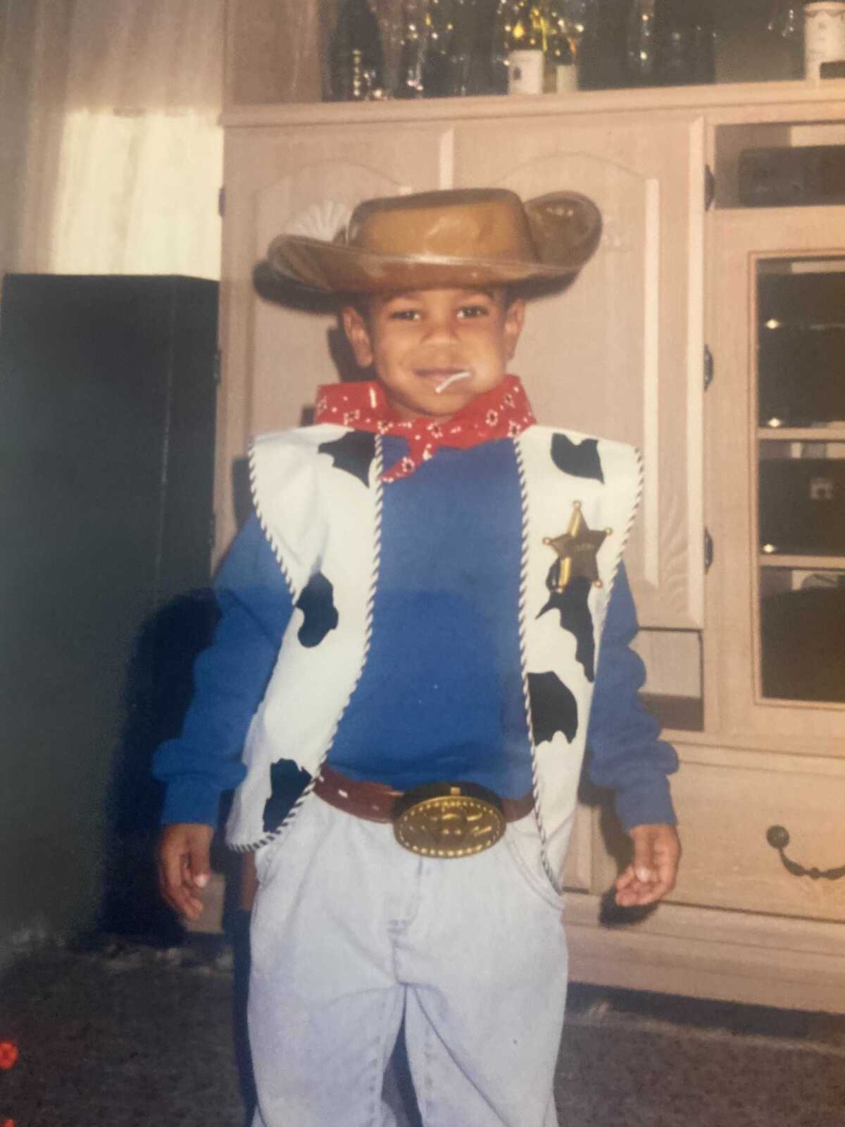 Michael Silva dressed as a sheriff as a child