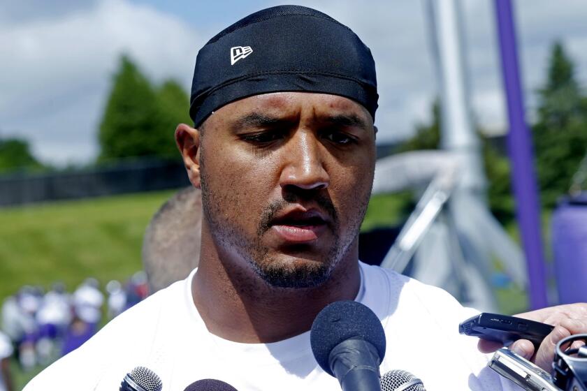 Minnesota Vikings wide receiver Michael Floyd talks with reporters after the NFL football team practice Wednesday, May 24, 2017, in Eden Prairie, Minn. (AP Photo/Jim Mone)