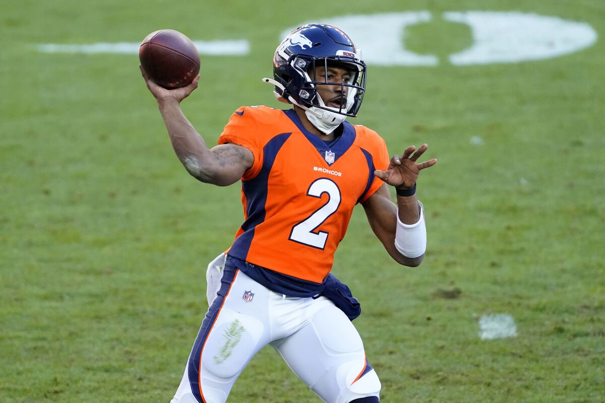 Denver Broncos quarterback Kendall Hinton throws against the New Orleans Saints on Sunday.