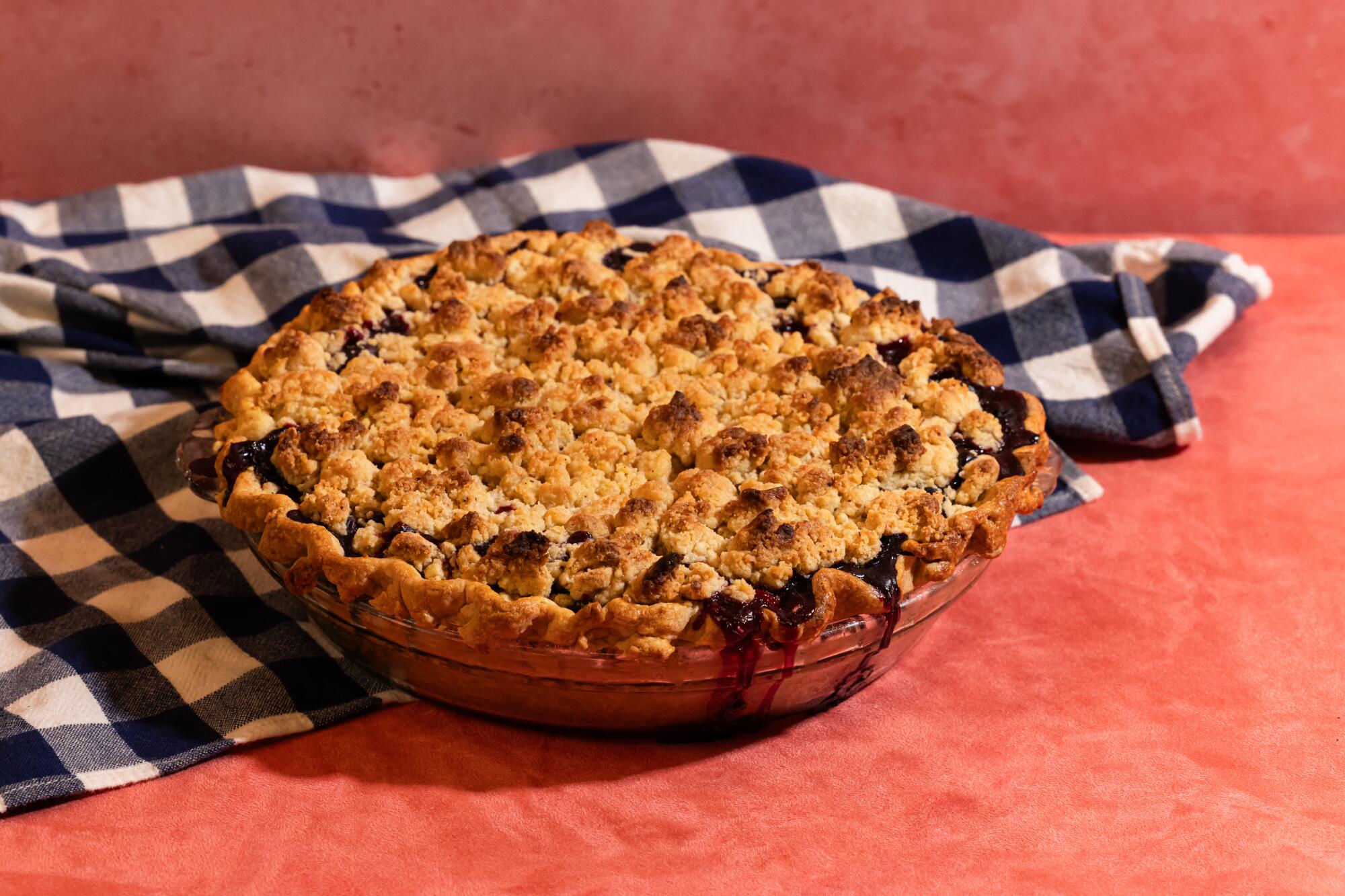 a mixed-berry pie with golden flaky crust and crumble topping in the L.A. Times kitchen.