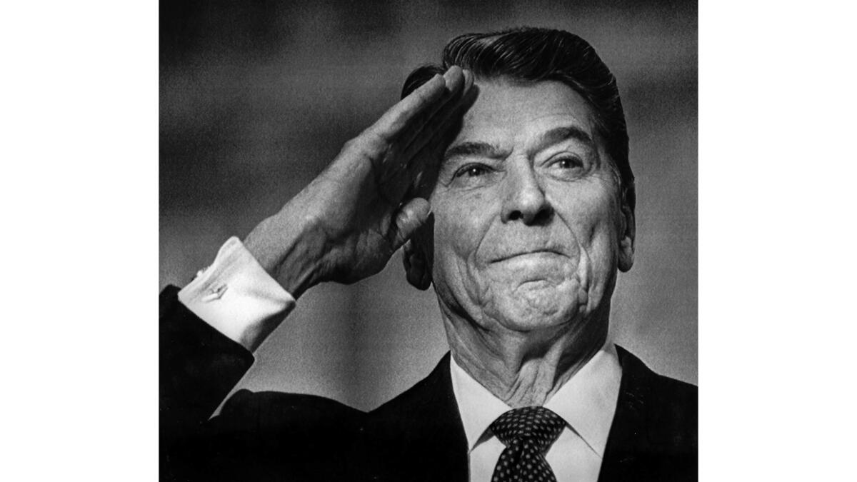 President Reagan gives a salute.