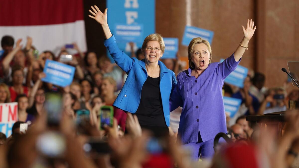 Elizabeth Warren, left, with Hillary Clinton in June 2016.