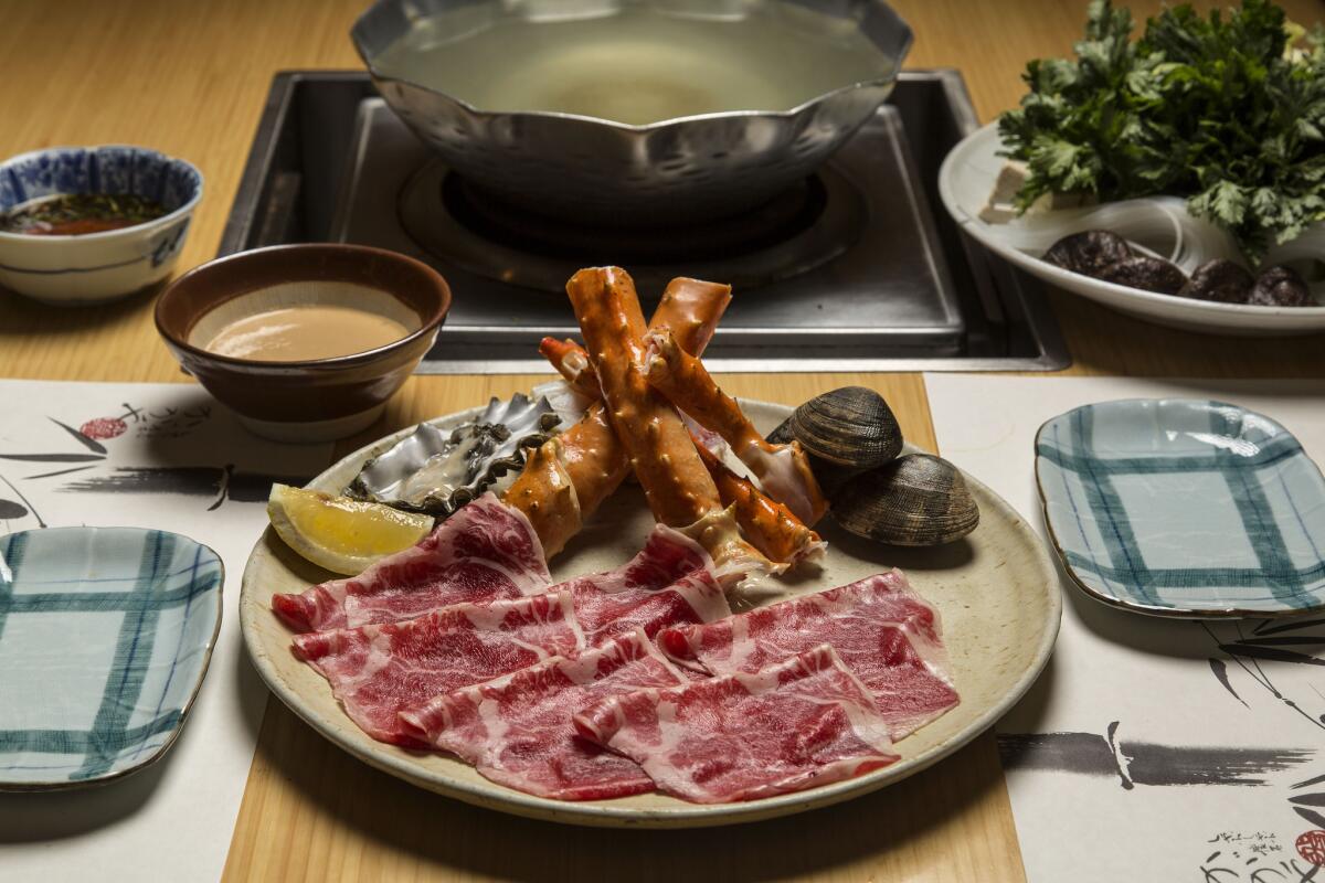 At Kagaya in Little Tokyo, a table is set for Japanese shabu shabu.