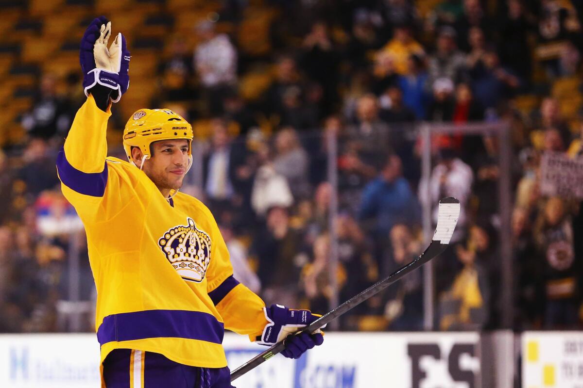 Milan Lucic acknowledges the crowd after the Kings' 9-2 win over the Bruins on Feb. 9 in Boston.
