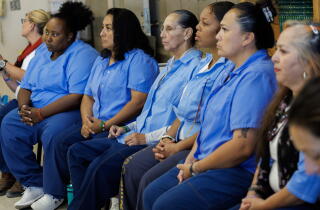 A row of seated women.