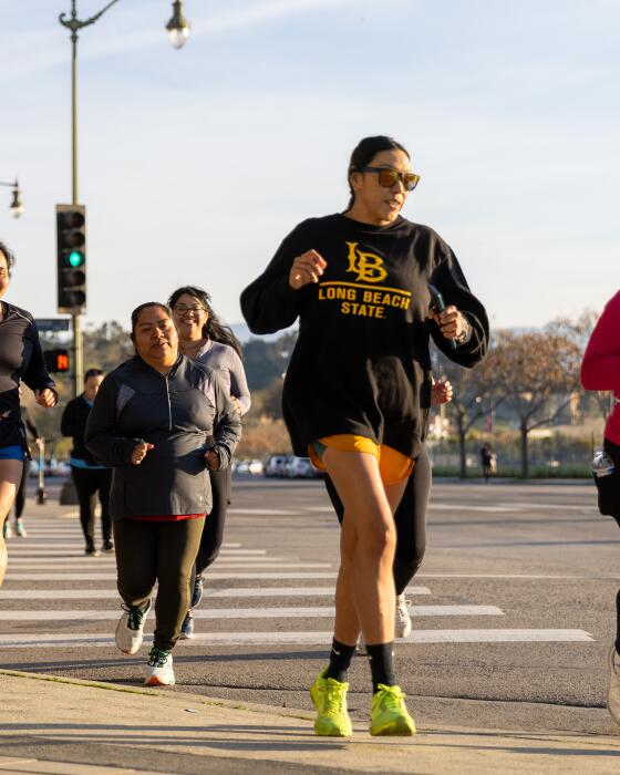 Running Mamis begin their practice run at LA Historic Park, Sunday, March 10, 2024.