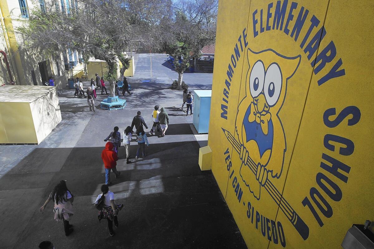 Miramonte Elementary School in South Los Angeles. In the wake of the campus' child abuse scandal, the Los Angeles school district took unprecedented steps to better protect students. But some wonder if the new approach has gone too far.