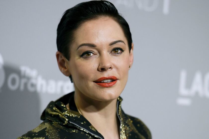 FILE - In this April 15, 2015 file photo, Rose McGowan arrives at the LA Premiere Of "DIOR & I" held at the Leo S. Bing Theatre in Los Angeles. McGowan emerged from a brief suspension on Twitter on Thursday, Oct. 12, 2017, to offer her most pointed accusation that she was sexually abused by film mogul Harvey Weinstein. Weinstein's representative says the producer denies he engaged in "any non-consensual contact." (Photo by Richard Shotwell/Invision/AP, File)