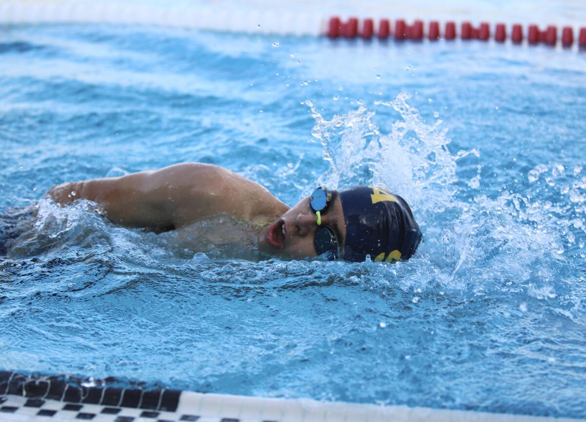 St. Monica Academy's Mateo Escovar, who has cerebral palsy, swam in the first-ever adaptive heat at Southern Section prelims.