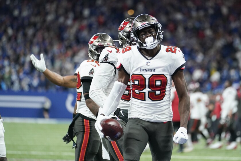 Tampa Bay Buccaneers' Pierre Desir (29) reacts after making an interception to end the game against the Indianapolis Colts in an NFL football game, Sunday, Nov. 28, 2021, in Indianapolis. (AP Photo/Michael Conroy)