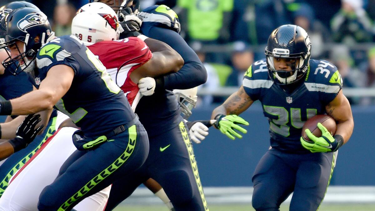 The Seahawks will look to get Thomas Rawls (34) some running room against the Lions during their wild-card game Saturday.